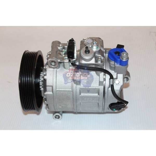 Audi AC Compressor made of steel and plastic parts on white background