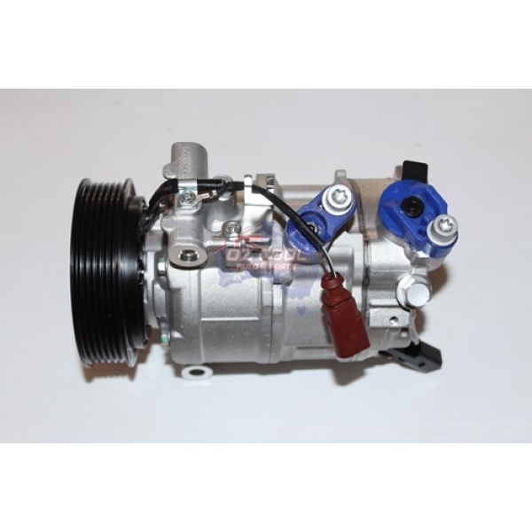 Audi A4 AC Compressor with plastic parts on white background