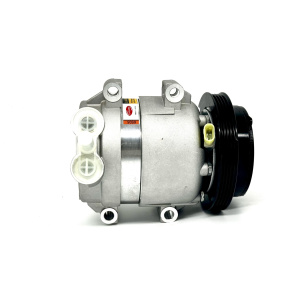 A Silver Ac Compressor for Holden LS1 with black pully on white background